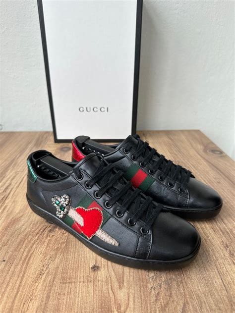 Gucci pierced heart ace shoes